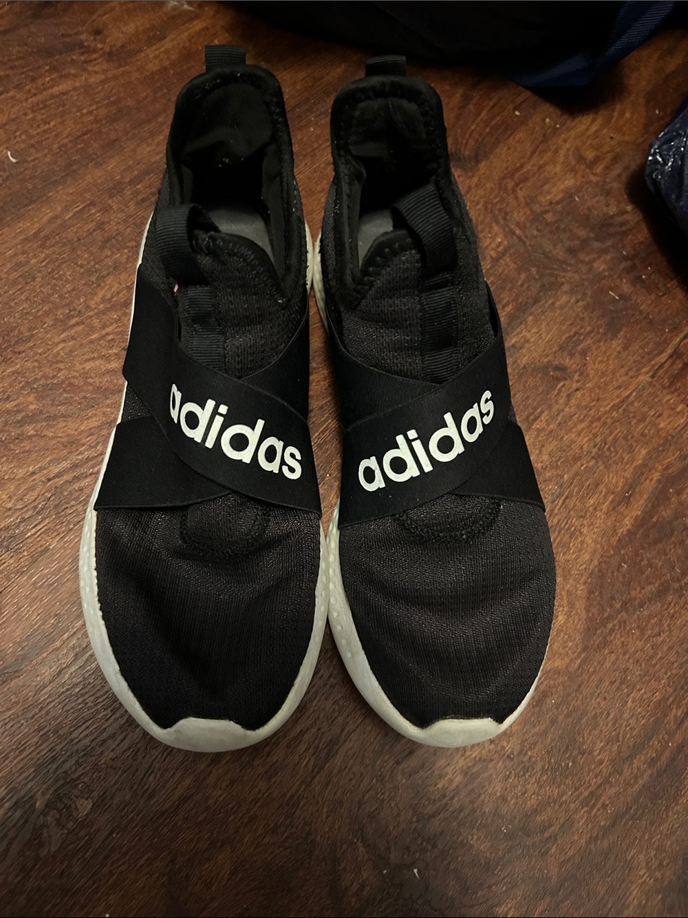 adidas mens Black and White Slip-On Sneakers